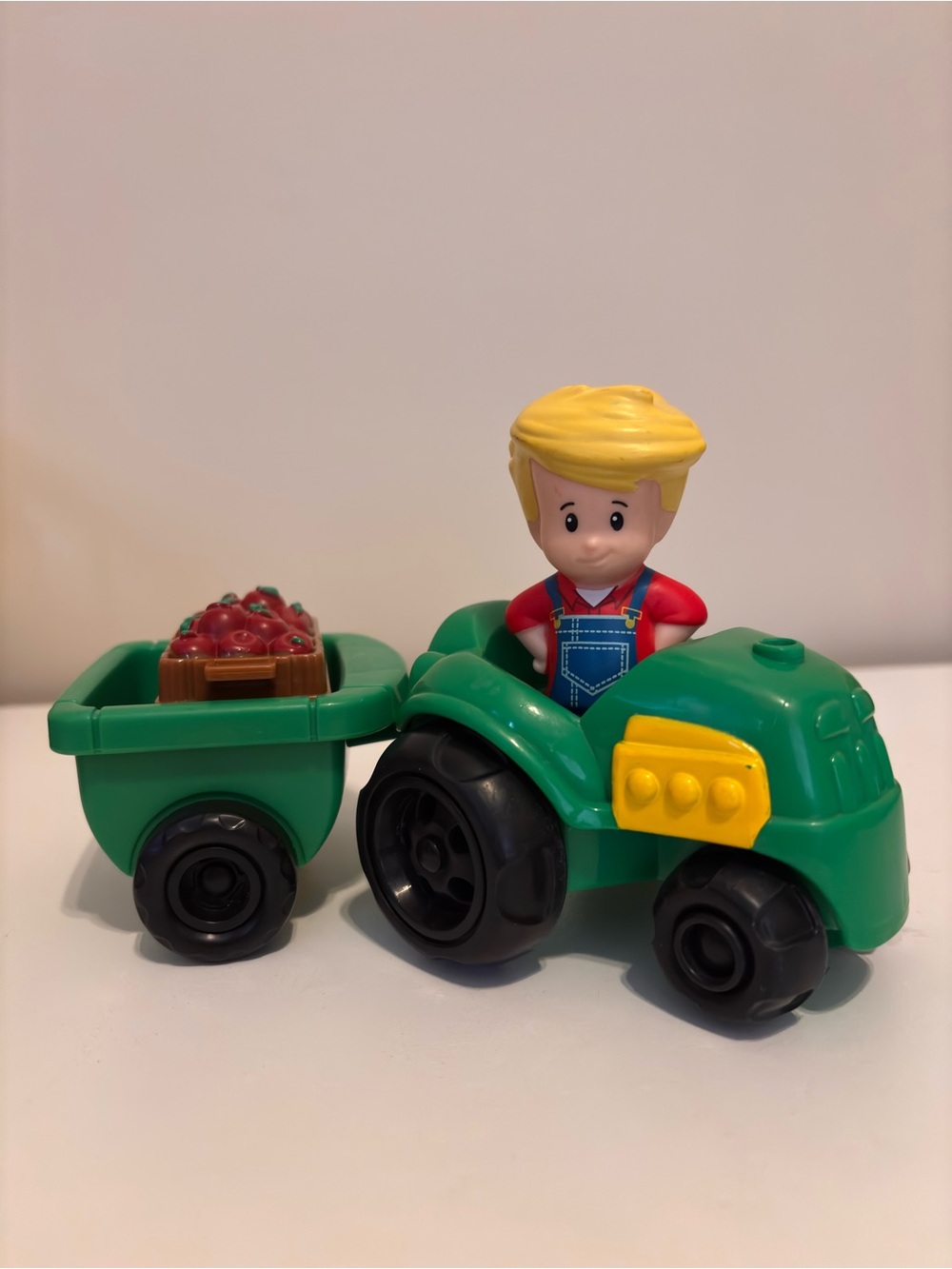 Fisher-Price Green Tractor with Farmer Figure and Apple Trailer
